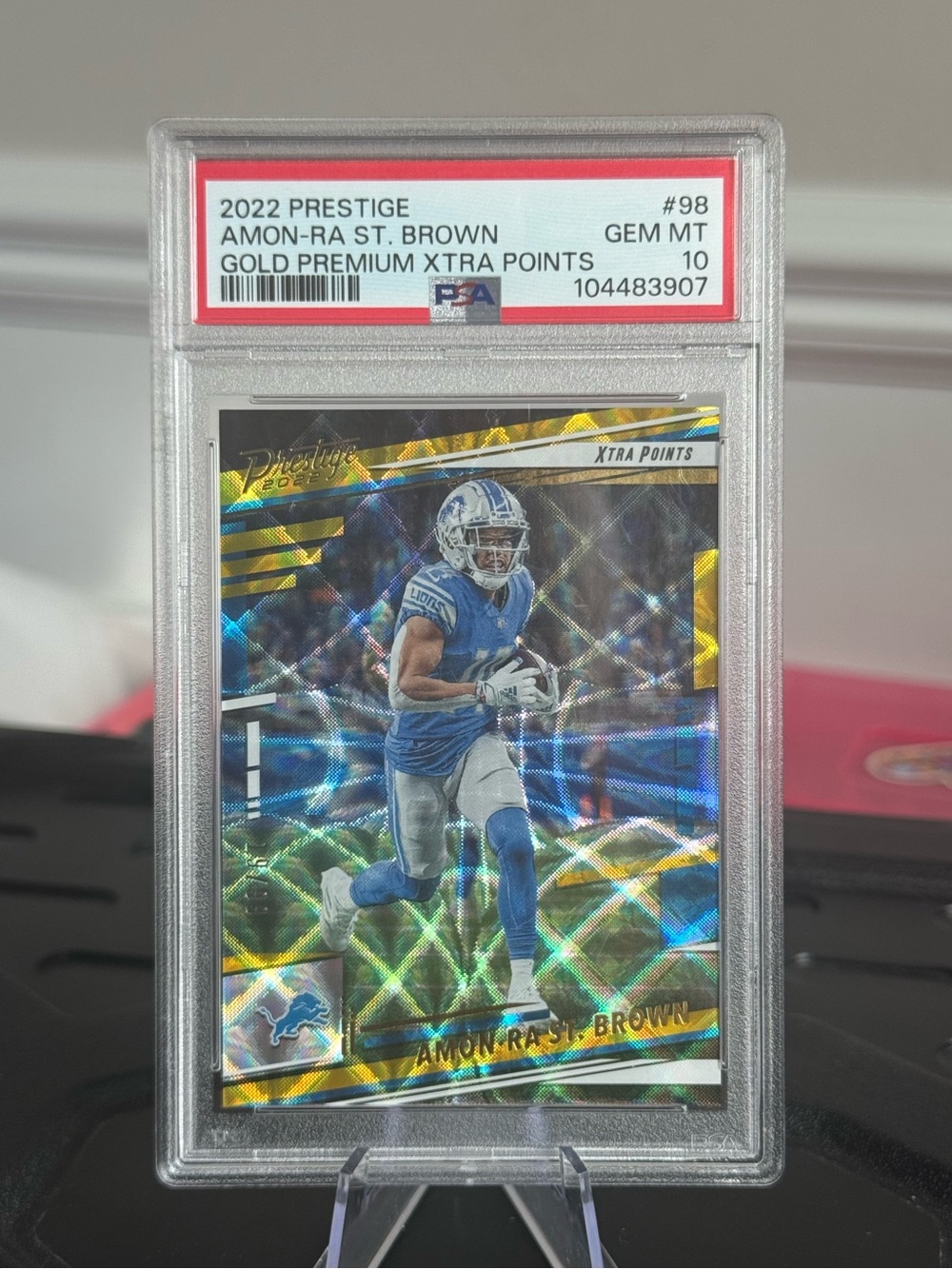 2022 Amon-Ra St. Brown Panini Prestige Gold Premium Xtra Points /99 PSA 10